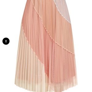 Refinity mesh skirt size 18/M in shades of gray, pink and creams.